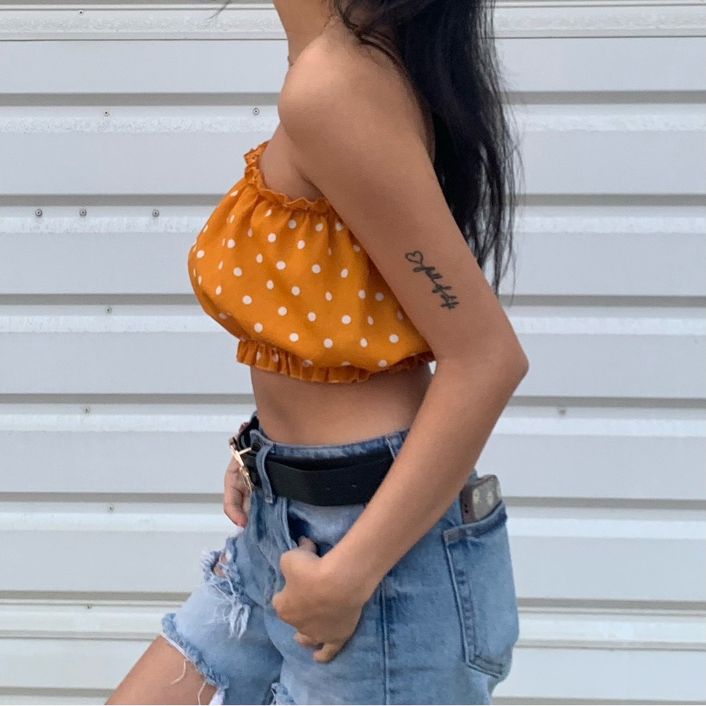 Orange with white polka dot tube top